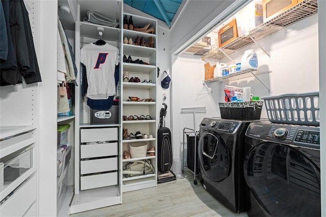 161 N Barton St, Norcross, GA 30071 - washroom with washing machine and clothes dryer and wood finished floors