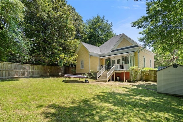 161 N Barton St, Norcross, GA 30071 - rear view of house featuring a trampoline and stairs