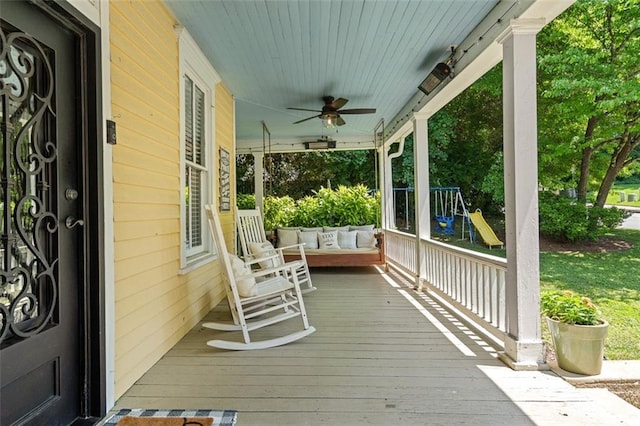 161 N Barton St, Norcross, GA 30071 - porch featuring a ceiling fan and a playground
