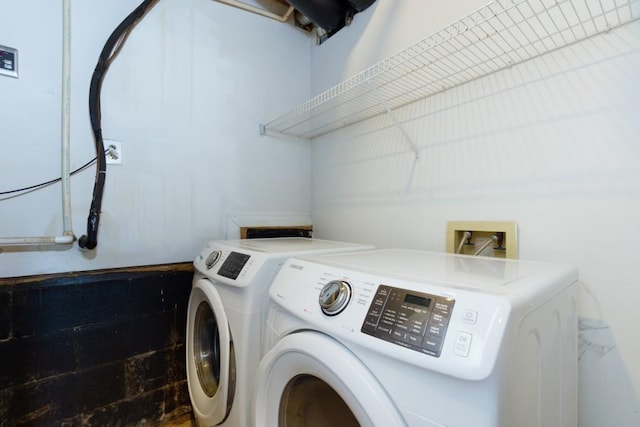 laundry room with washer and dryer