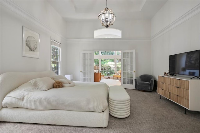 12160 Oak Hollow Way, Alpharetta, GA 30005 - carpeted bedroom with a chandelier, french doors, and a towering ceiling