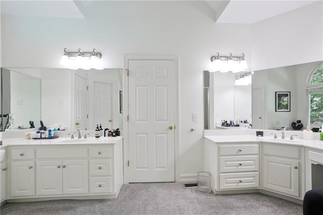12160 Oak Hollow Way, Alpharetta, GA 30005 - full bathroom with two vanities and carpet floors