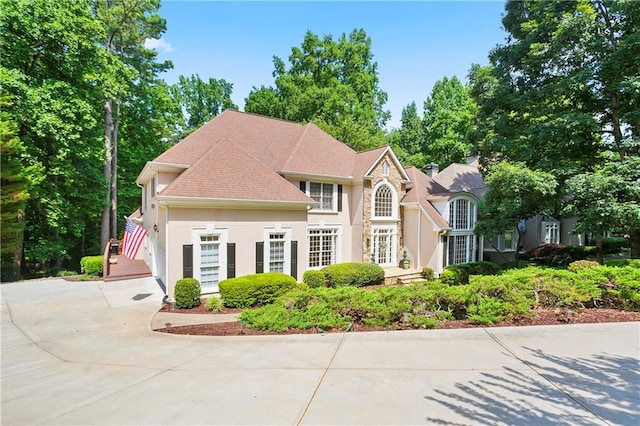 12160 Oak Hollow Way, Alpharetta, GA 30005 - view of front of property featuring stucco siding and concrete driveway
