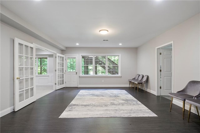 12160 Oak Hollow Way, Alpharetta, GA 30005 - living area with french doors, healthy amount of natural light, dark wood-style floors, and recessed lighting