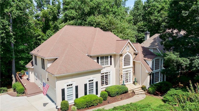 12160 Oak Hollow Way, Alpharetta, GA 30005 - view of front of home featuring stucco siding, concrete driveway, french doors, and a shingled roof