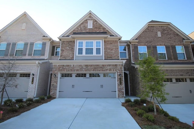 view of front facade with a garage, brick siding, and concrete driveway