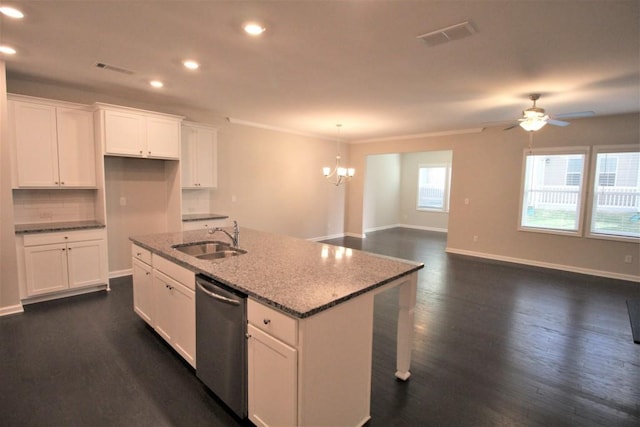 kitchen with tasteful backsplash, visible vents, stainless steel dishwasher, dark wood-style floors, and a sink