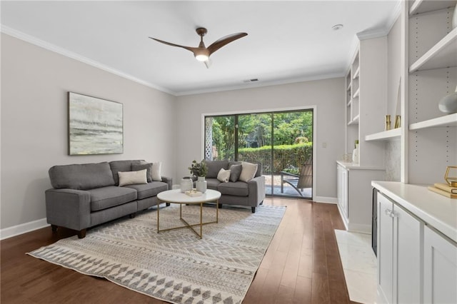 812 Dixie Ave NE, Atlanta, GA 30307 - living room with wood-type flooring, a ceiling fan, and crown molding