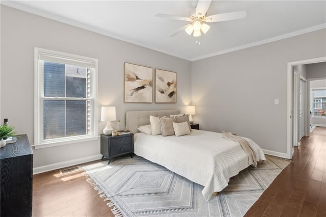 812 Dixie Ave NE, Atlanta, GA 30307 - bedroom featuring crown molding, wood finished floors, and ceiling fan