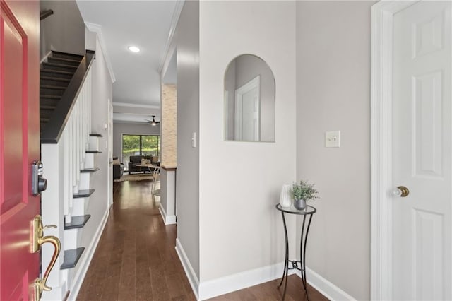 812 Dixie Ave NE, Atlanta, GA 30307 - foyer entrance featuring stairway, dark wood-type flooring, recessed lighting, and crown molding