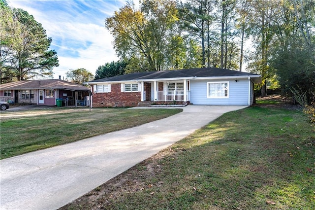 single story home featuring a front yard and a porch