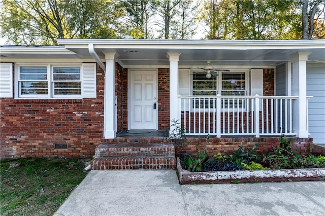 entrance to property featuring a porch