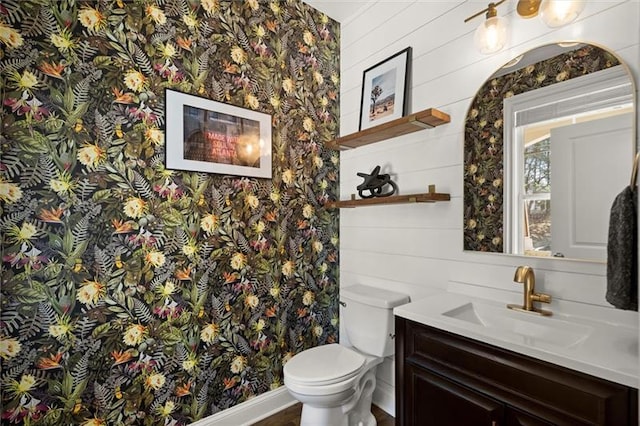 1744 Habershal Rd NW, Atlanta, GA 30318 - half bathroom featuring toilet, wallpapered walls, and vanity