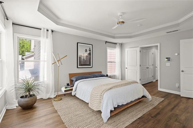 1744 Habershal Rd NW, Atlanta, GA 30318 - bedroom with a raised ceiling, baseboards, ornamental molding, and wood finished floors