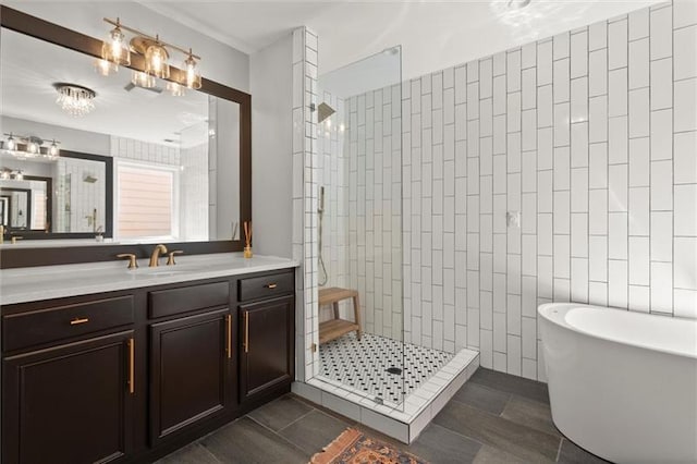 1744 Habershal Rd NW, Atlanta, GA 30318 - bathroom featuring tiled shower, a freestanding tub, vanity, and tile patterned floors