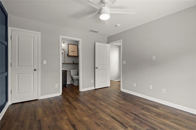 1744 Habershal Rd NW, Atlanta, GA 30318 - unfurnished bedroom with dark wood finished floors, baseboards, connected bathroom, and ceiling fan