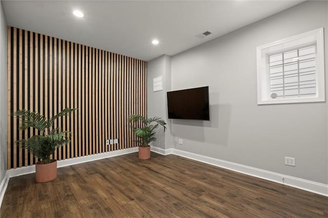 1744 Habershal Rd NW, Atlanta, GA 30318 - unfurnished living room featuring baseboards, wood finished floors, and recessed lighting