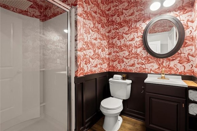 1744 Habershal Rd NW, Atlanta, GA 30318 - full bath with wallpapered walls, wainscoting, a stall shower, toilet, and vanity