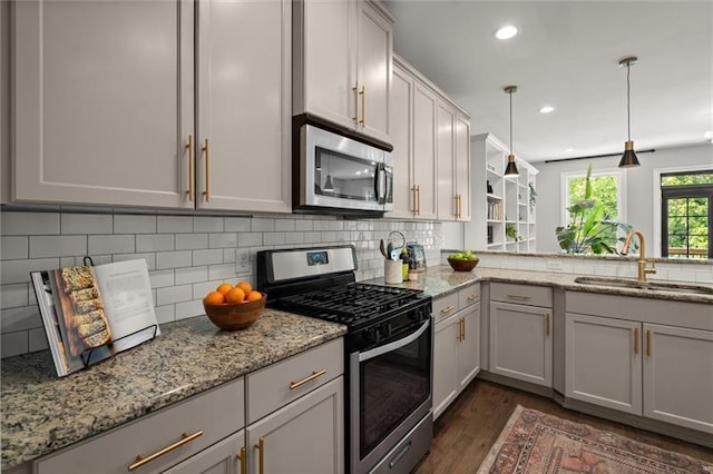 1744 Habershal Rd NW, Atlanta, GA 30318 - kitchen featuring appliances with stainless steel finishes, a sink, dark wood-style floors, recessed lighting, and tasteful backsplash