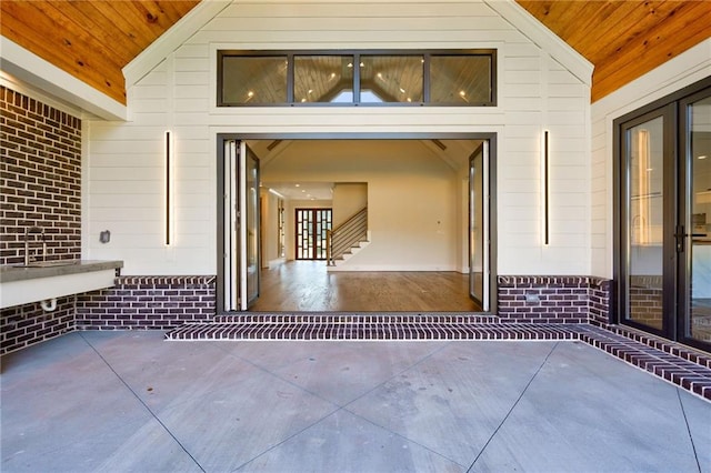 entrance to property with a patio