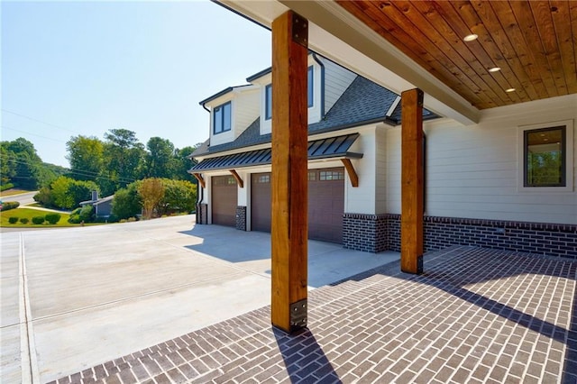 view of patio featuring a garage