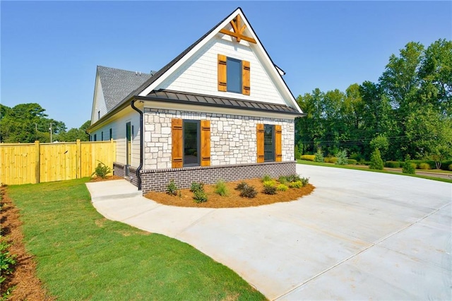 view of home's exterior featuring a lawn