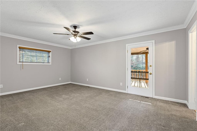 spare room with crown molding, carpet flooring, a ceiling fan, and a textured ceiling