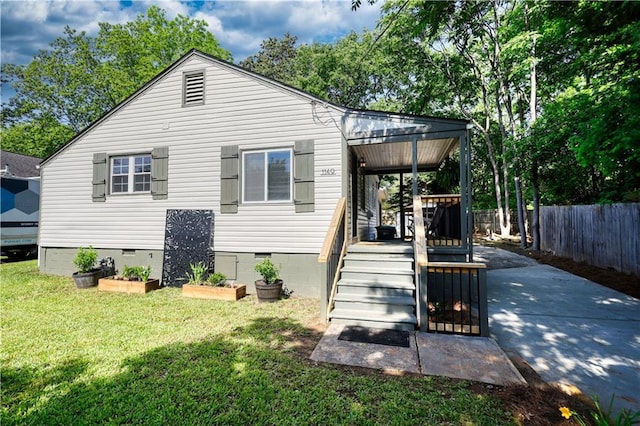 1149 Avondale Ave SE, Atlanta, GA 30312 - rear view of property featuring crawl space and a garden