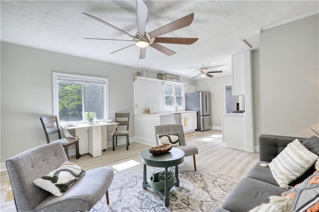 1149 Avondale Ave SE, Atlanta, GA 30312 - living area with light wood-style flooring, ceiling fan, and baseboards