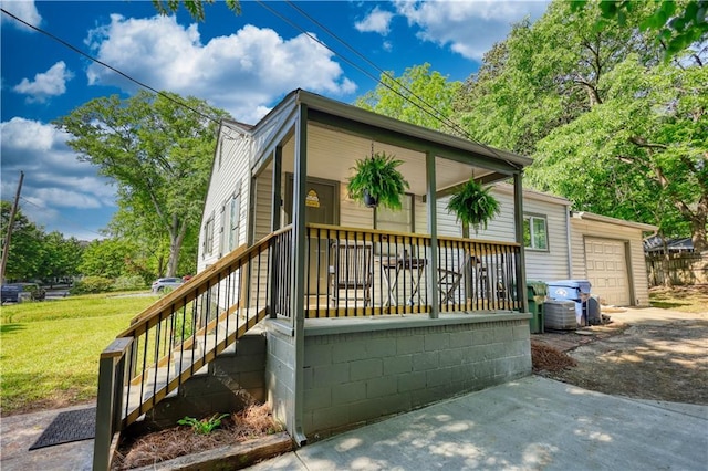 1149 Avondale Ave SE, Atlanta, GA 30312 - rear view of house with covered porch and a lawn