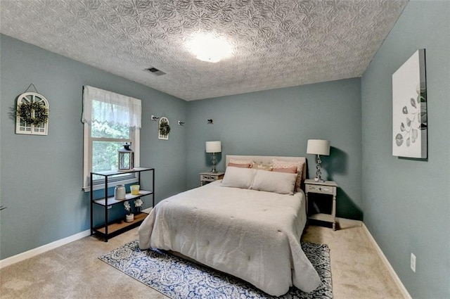 bedroom featuring carpet flooring and baseboards