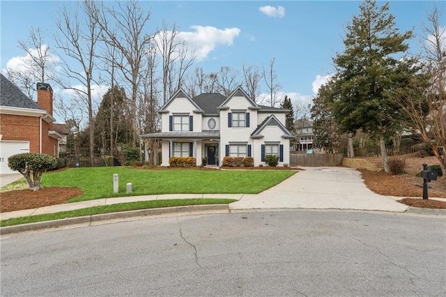 view of front of house featuring a front lawn