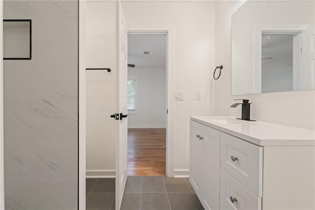 bathroom featuring tile patterned floors and vanity