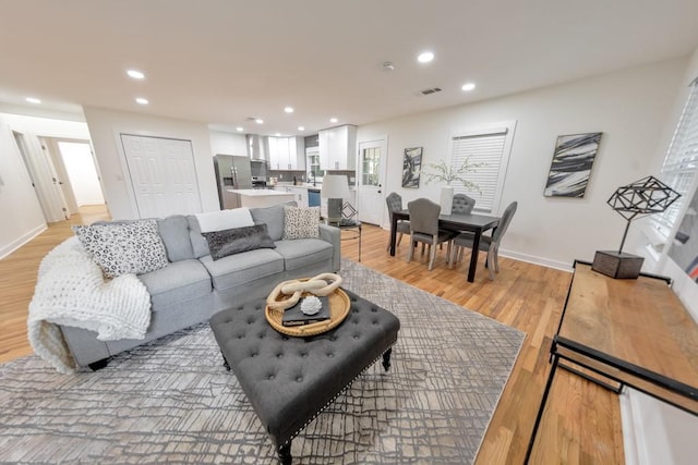 living room featuring light wood-type flooring