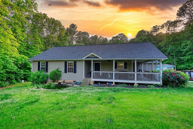160 Riverbrooke Trl, Covington, GA 30016 - view of front of house featuring covered porch, a front lawn, and a shingled roof