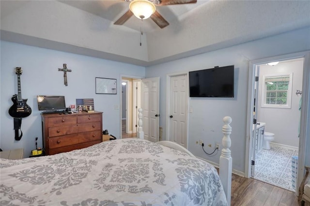 160 Riverbrooke Trl, Covington, GA 30016 - bedroom featuring wood finished floors, connected bathroom, a ceiling fan, a closet, and baseboards