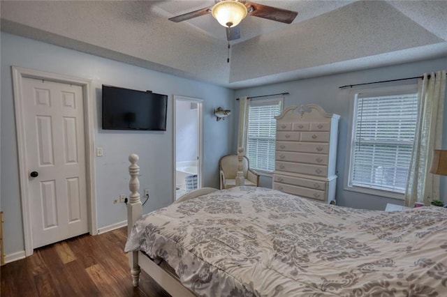 160 Riverbrooke Trl, Covington, GA 30016 - bedroom with wood finished floors, a textured ceiling, baseboards, and ceiling fan