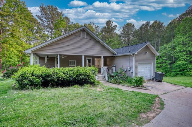 160 Riverbrooke Trl, Covington, GA 30016 - ranch-style home with a garage, driveway, a porch, a front lawn, and ceiling fan