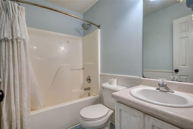 160 Riverbrooke Trl, Covington, GA 30016 - bathroom featuring a wainscoted wall, shower / bathtub combination with curtain, toilet, and vanity