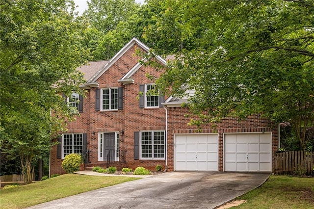 colonial inspired home with concrete driveway, a garage, and brick siding
