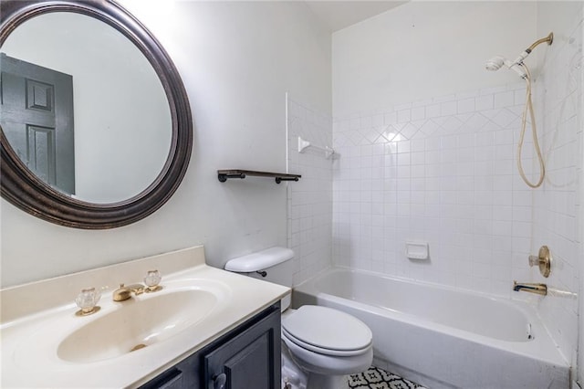 bathroom featuring toilet, vanity, and  shower combination