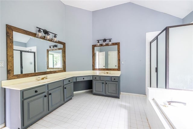 full bath with lofted ceiling, a stall shower, double vanity, a garden tub, and tile patterned flooring
