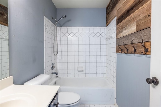 full bathroom featuring toilet, tub / shower combination, and vanity