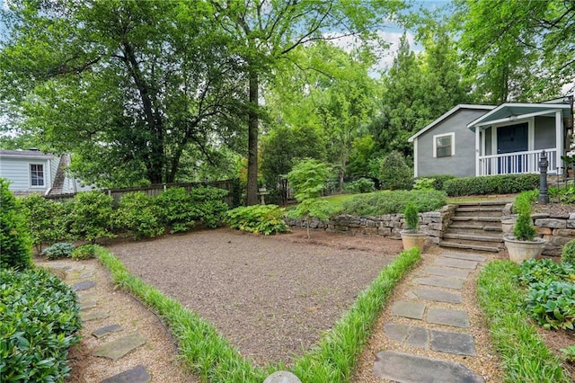 25 Standish Ave NW, Atlanta, GA 30309 - view of yard with fence, stairs, and a porch