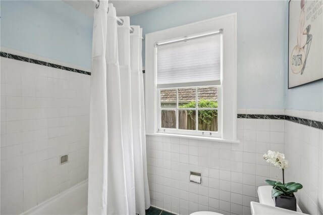 25 Standish Ave NW, Atlanta, GA 30309 - full bath with tile walls, shower / tub combo with curtain, and toilet