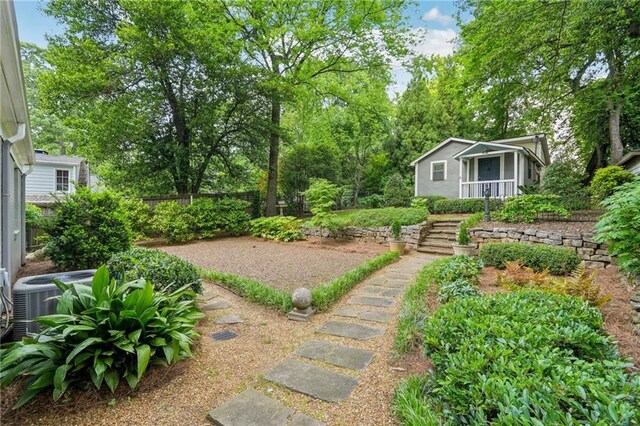 25 Standish Ave NW, Atlanta, GA 30309 - view of yard featuring central AC unit and fence