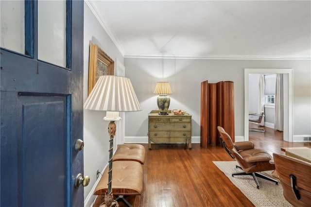 25 Standish Ave NW, Atlanta, GA 30309 - living area featuring crown molding, wood finished floors, and baseboards
