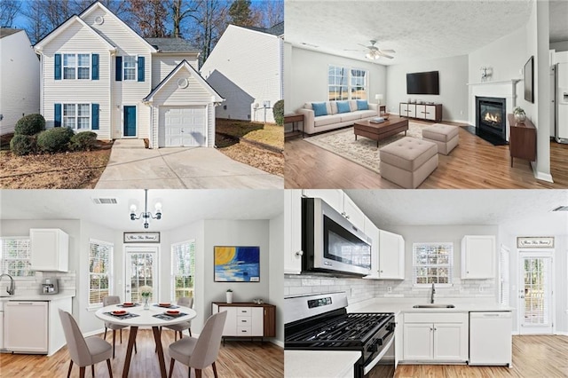 kitchen with white cabinets, ceiling fan with notable chandelier, stainless steel appliances, and a wealth of natural light