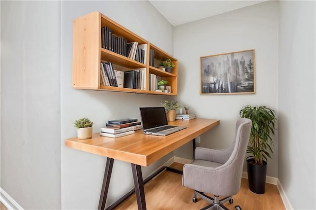 home office with light wood-type flooring