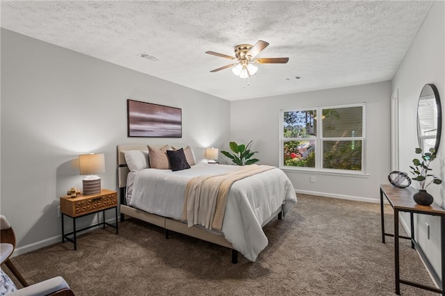 3833 Paddington Trl, Rex, GA 30273 - carpeted bedroom featuring multiple windows, a textured ceiling, and ceiling fan